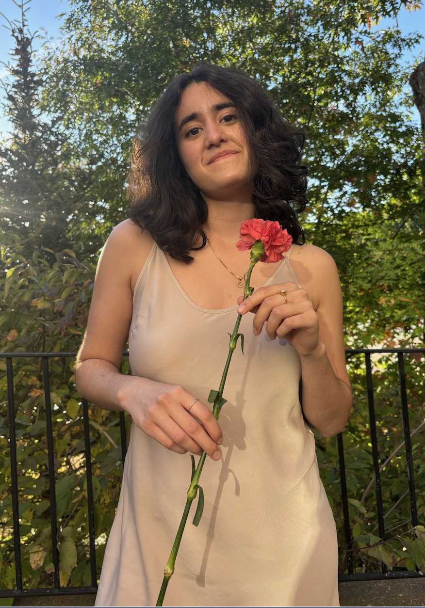 Image of me holding a flower